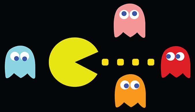 Big yellow pac man eating four colored pac man ghosts