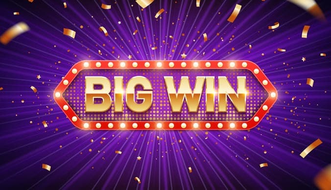 Big Win sign in red and gold on a purple background